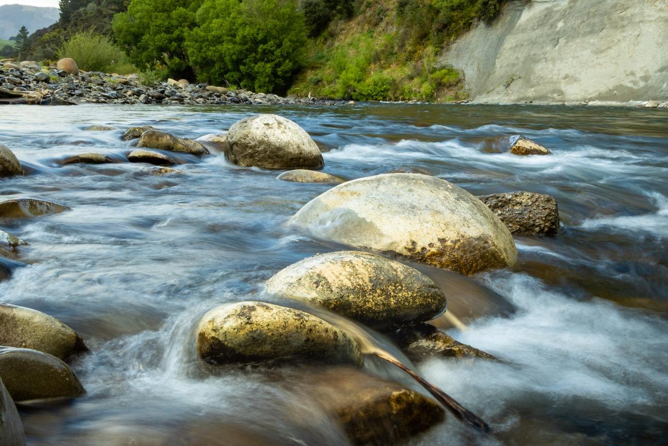 The river over its boulders